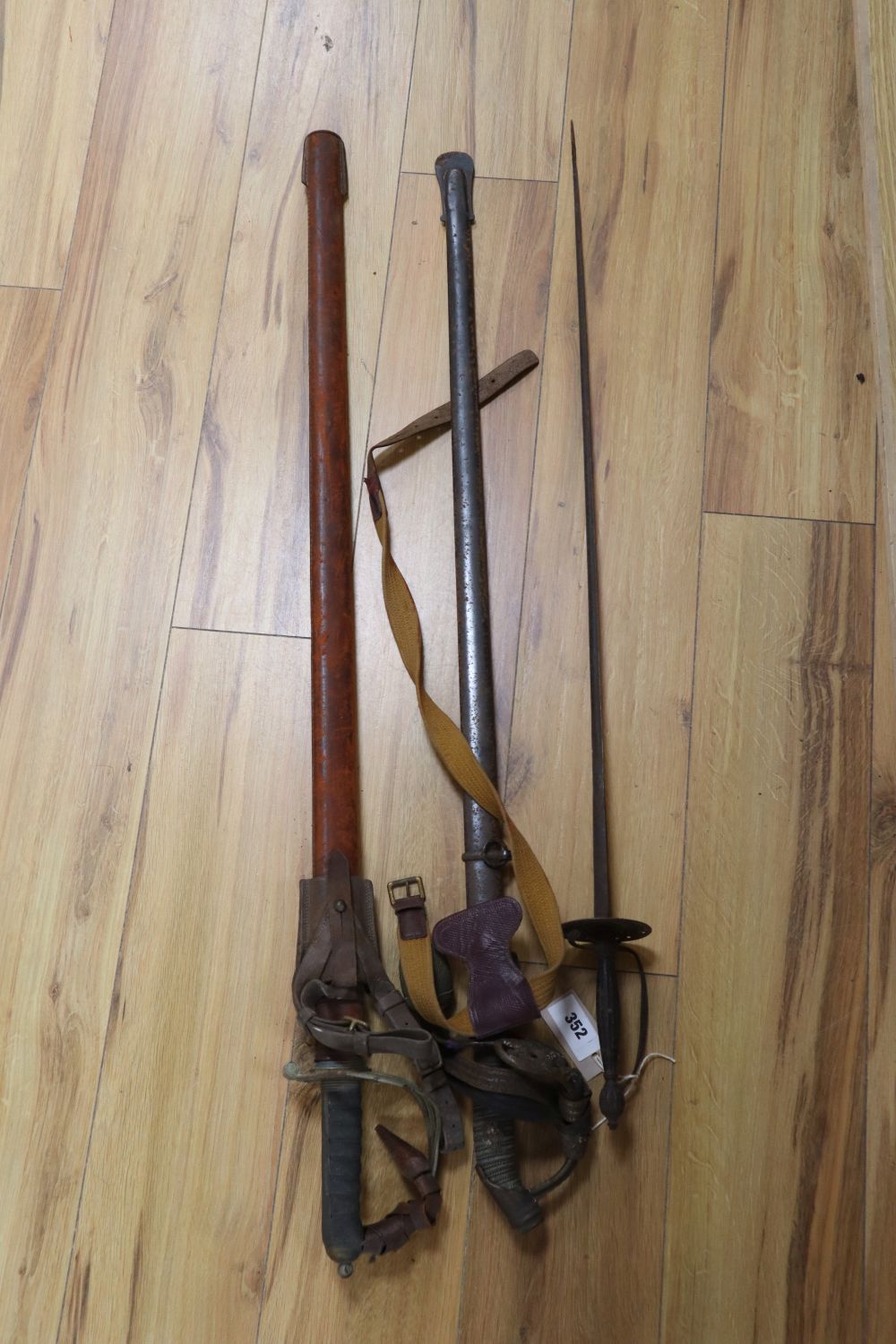 An 1822 pattern officers infantry sword, a Prussian officers sword and a court sword